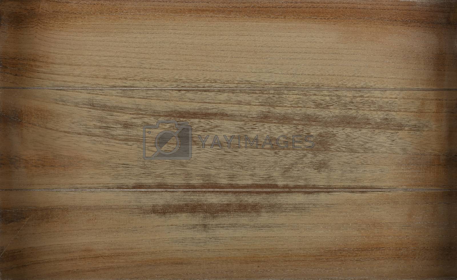 Royalty free image of Grunge brown wooden background texture by BreakingTheWalls