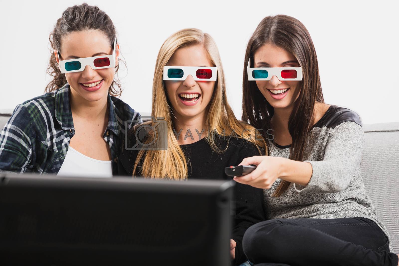 Royalty free image of Girls watching 3D movies  by Iko
