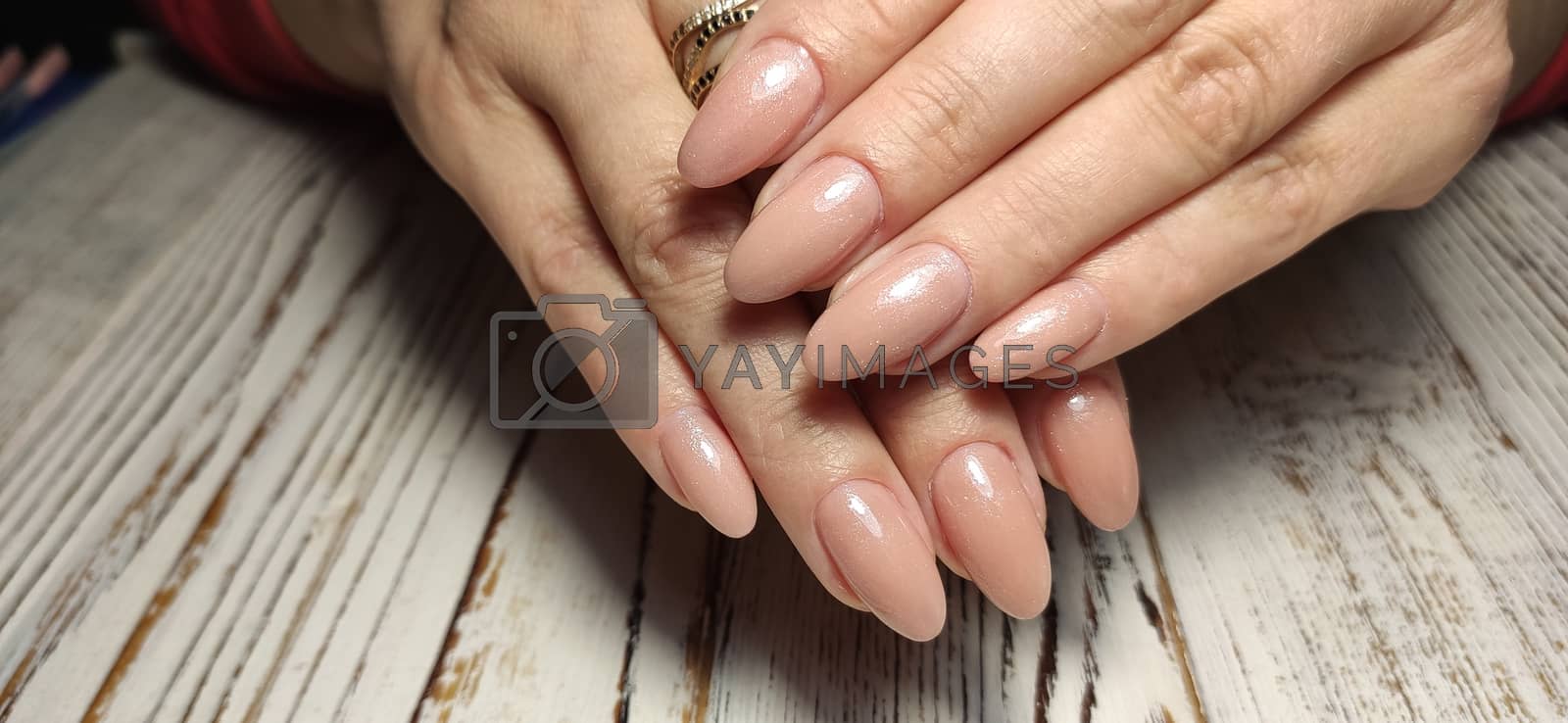 Royalty free image of Hands Care. Design Hand With Pastel Nails by SmirMaxStock