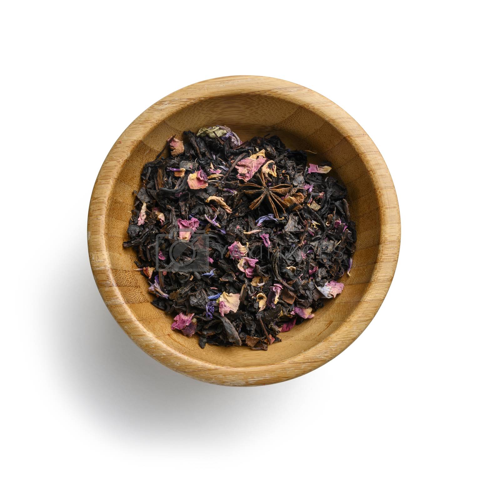 Royalty free image of Black tea with natural aromatic additives. Top view on white background by butenkow