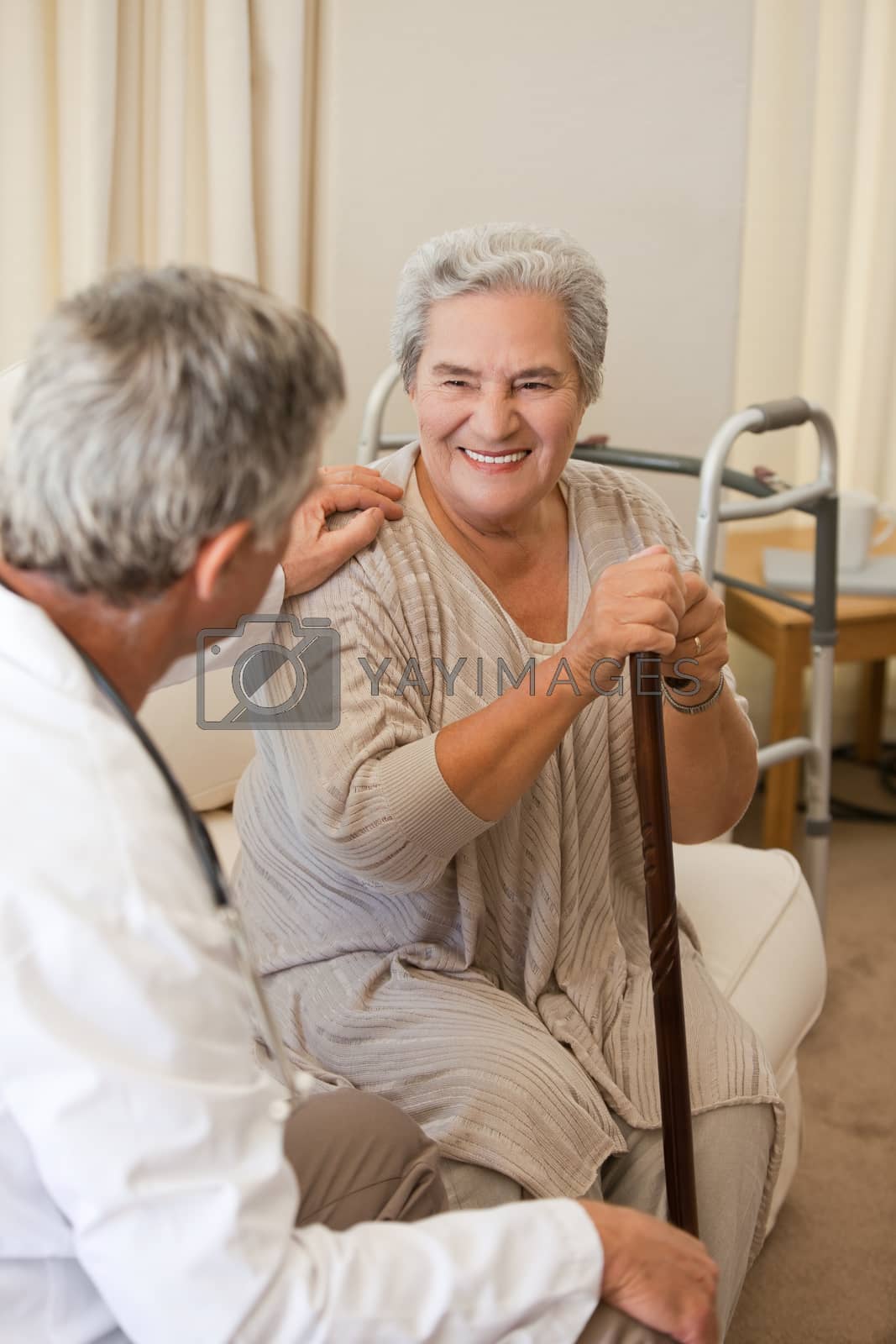 Royalty free image of Senior doctor talking with his patient by Wavebreakmedia