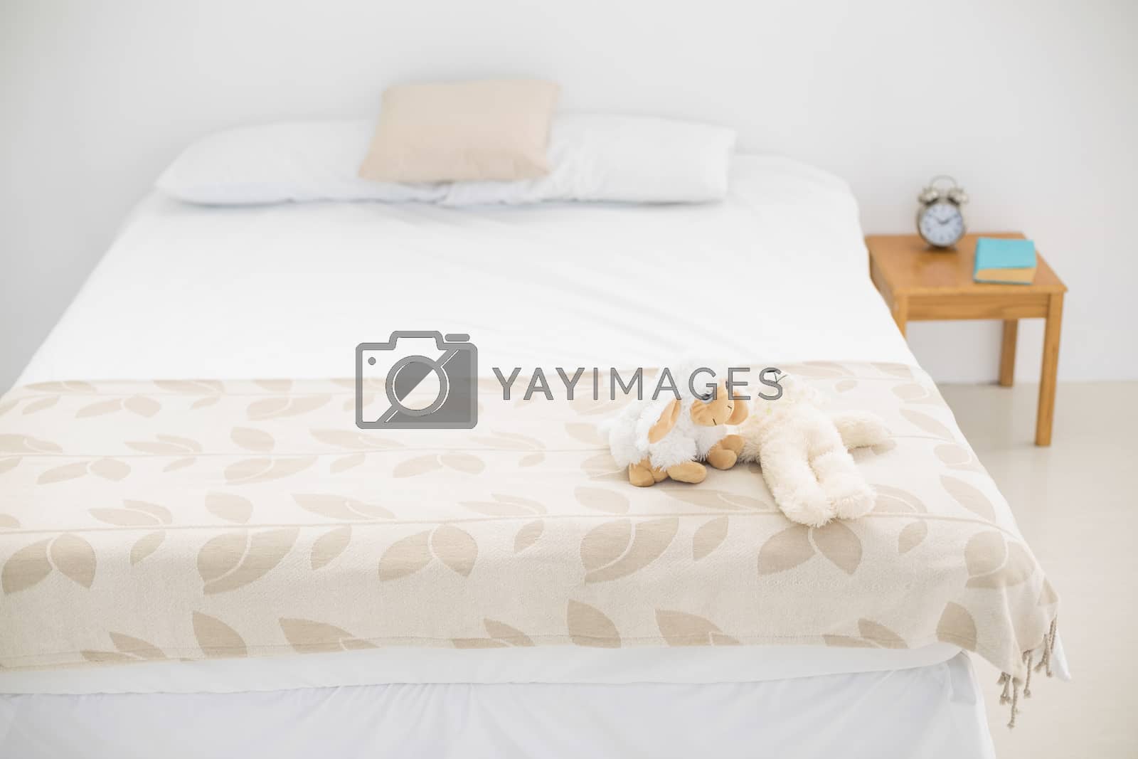 Royalty free image of Brightly lit bedroom by Wavebreakmedia