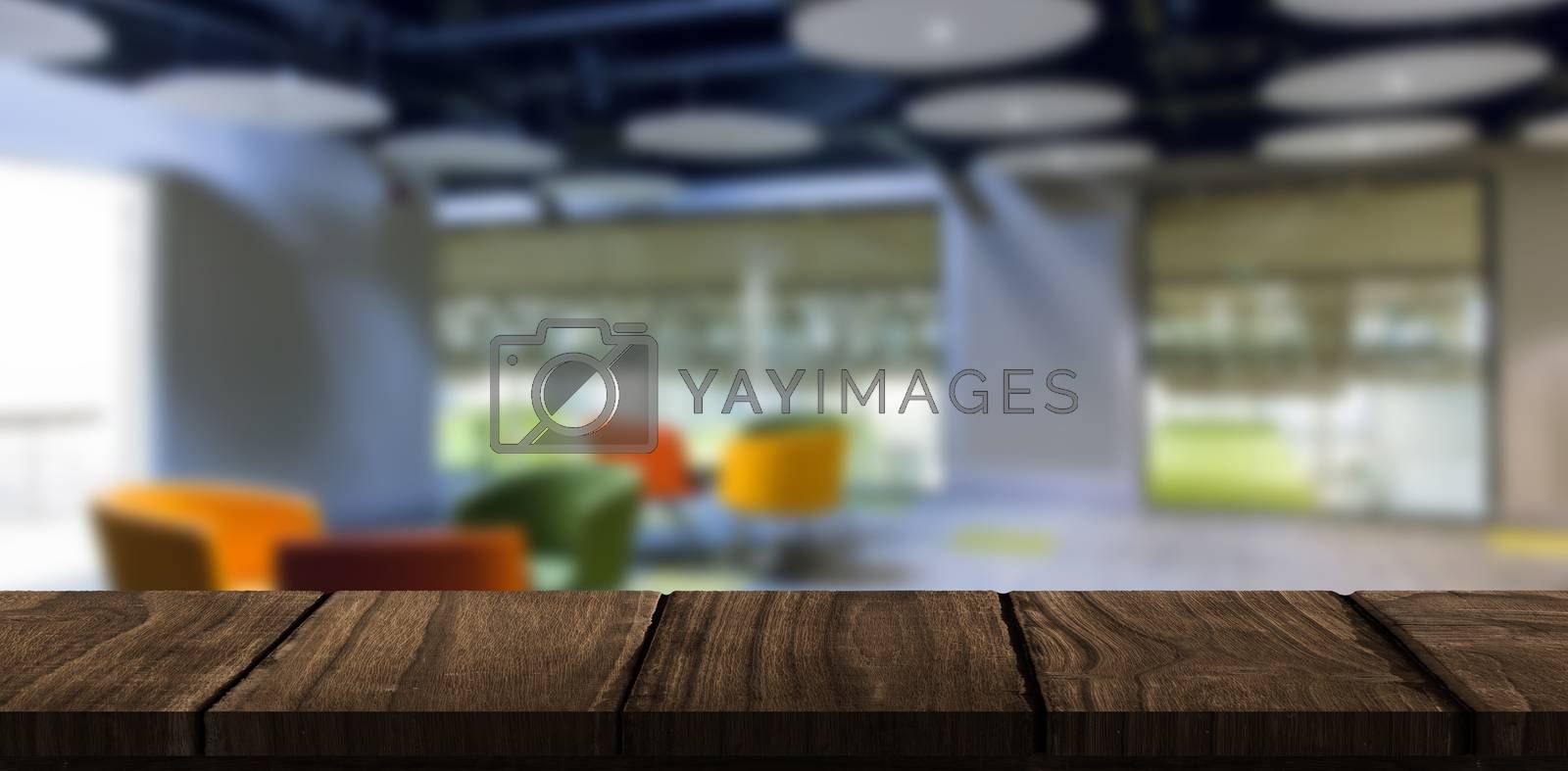 Royalty free image of Composite image of wooden desk by Wavebreakmedia