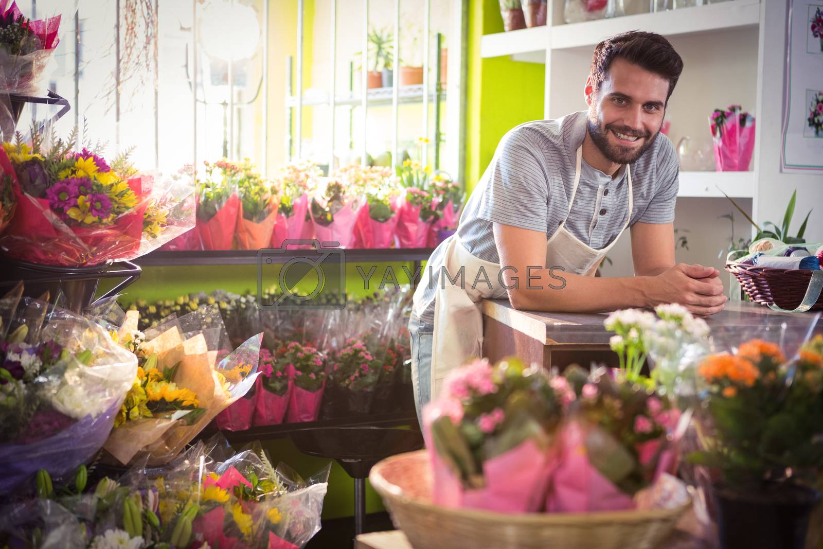 Royalty free image of Male florist at his flower shop by Wavebreakmedia