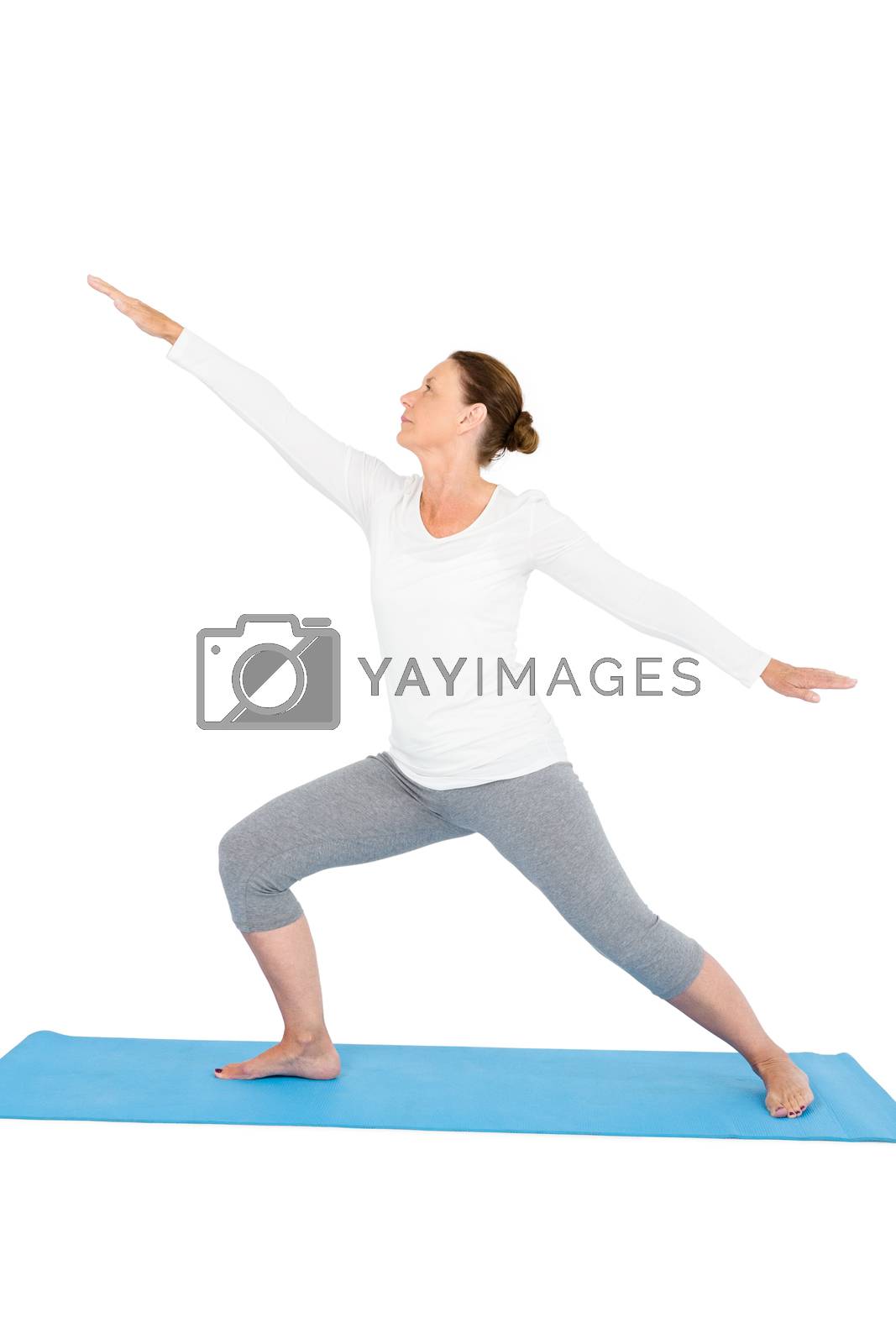 Royalty free image of Full length of woman with arms outstretched while exercising by Wavebreakmedia
