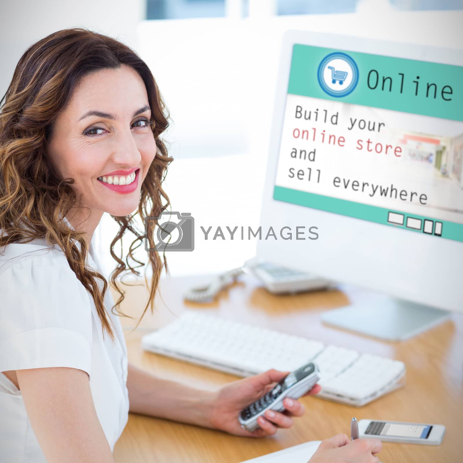 Royalty free image of Composite image of smiling businesswoman looking at camera by Wavebreakmedia