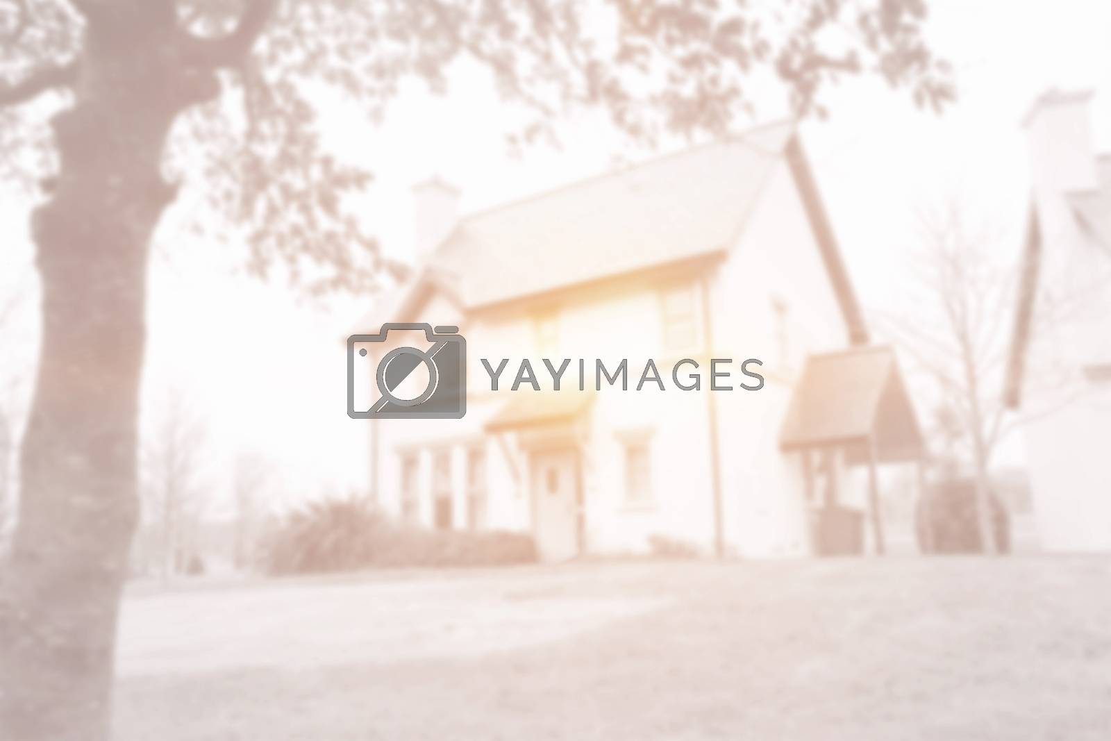 Royalty free image of Front of house and garden with bright light by Wavebreakmedia