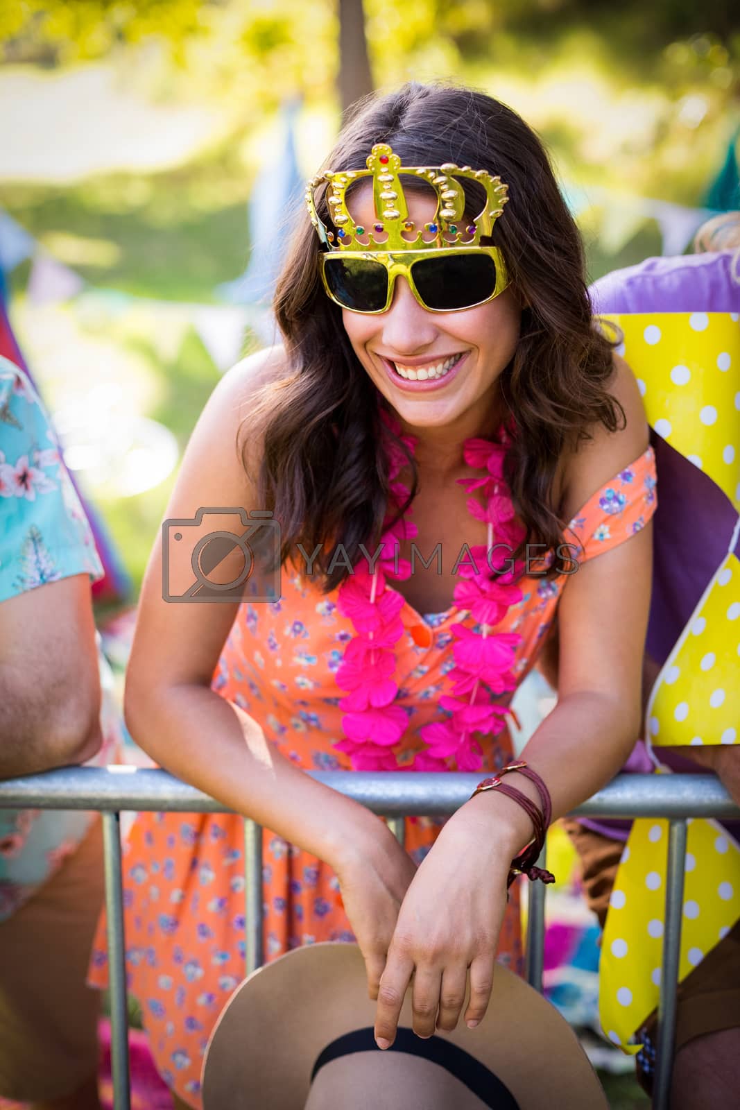 Royalty free image of Beautiful woman in fancy sunglasses by Wavebreakmedia