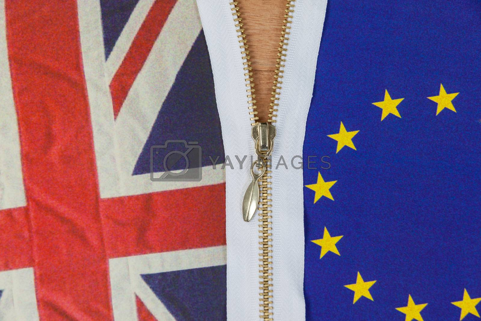Royalty free image of Union Jack and european union flag being unzipped to demonstrate brexit referendum concept by Wavebreakmedia