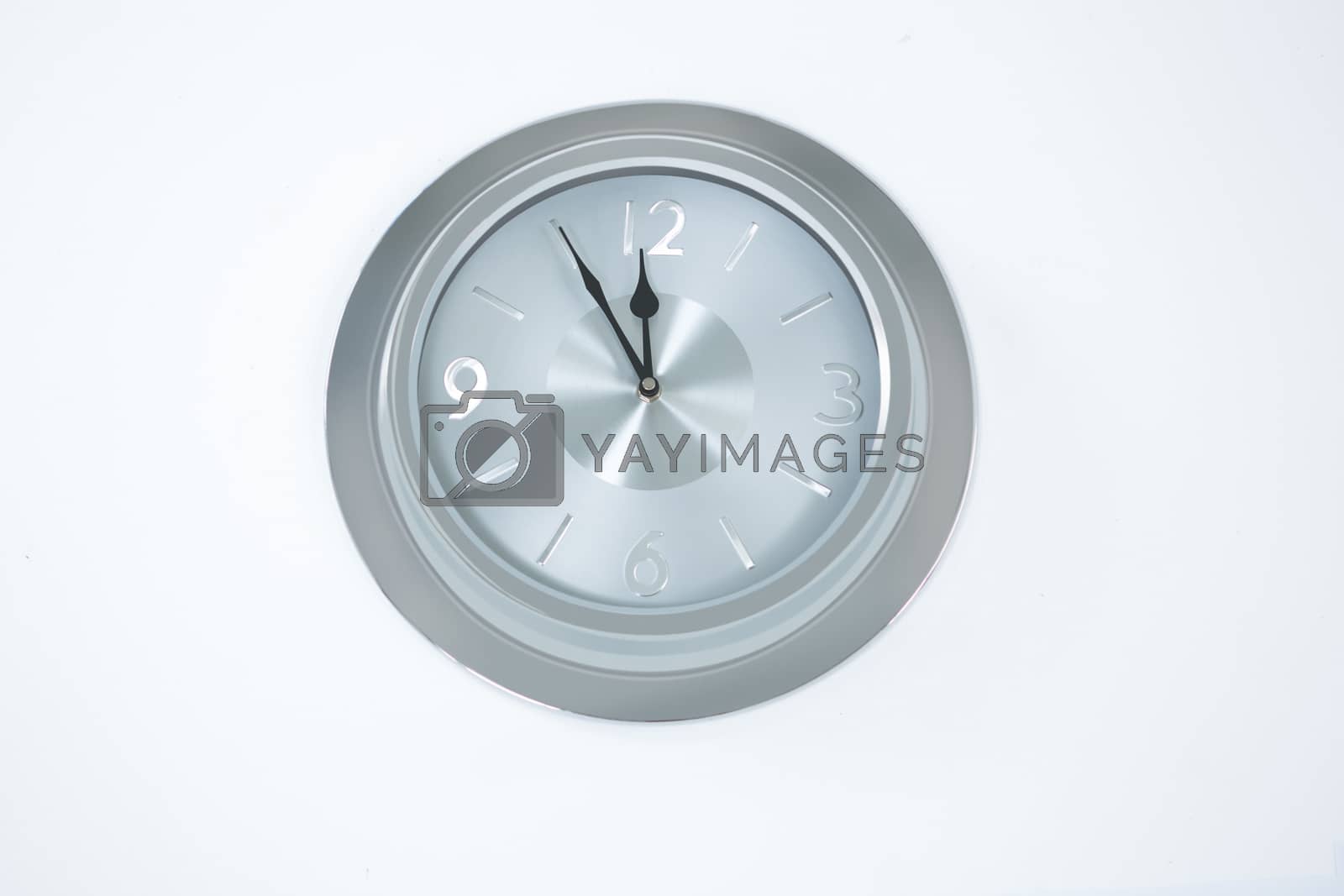 Royalty free image of Image of countdown to midnight on clock by Wavebreakmedia