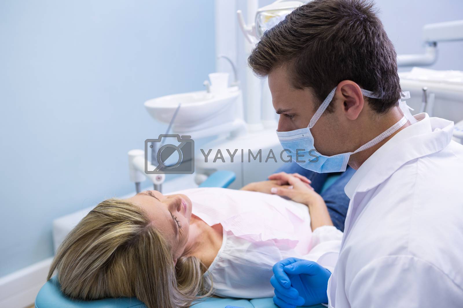 Royalty free image of Close up of doctor talking with patient by Wavebreakmedia