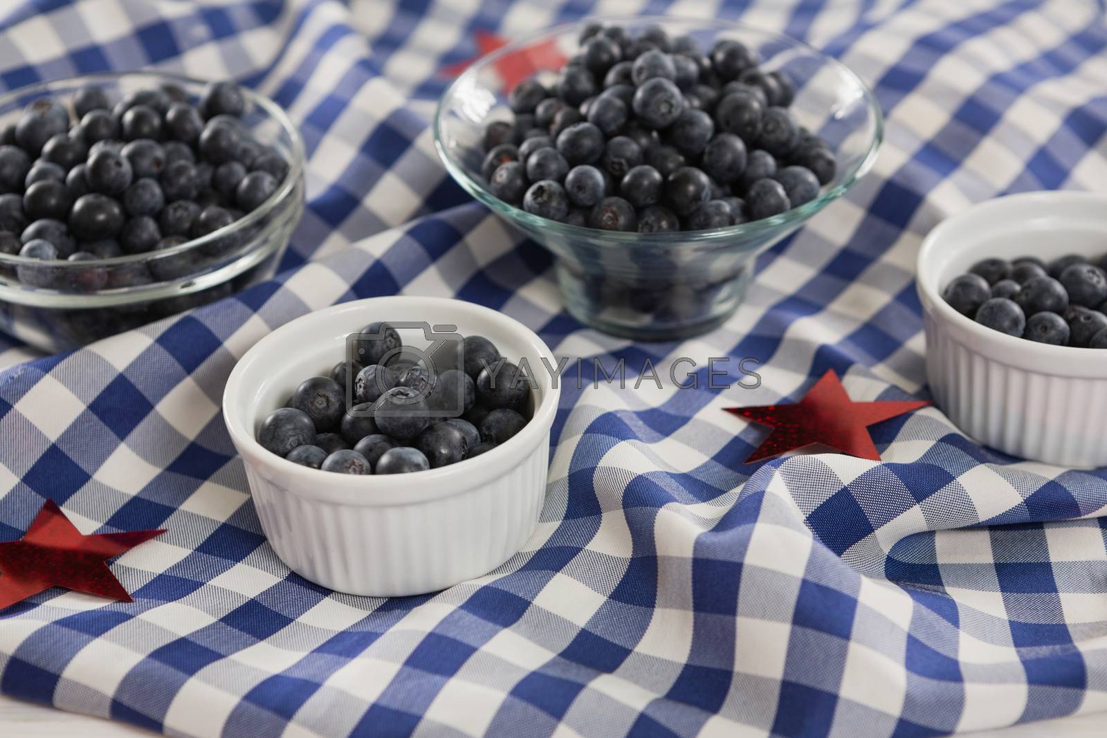 Royalty free image of Black berries in bowls with 4th july theme by Wavebreakmedia