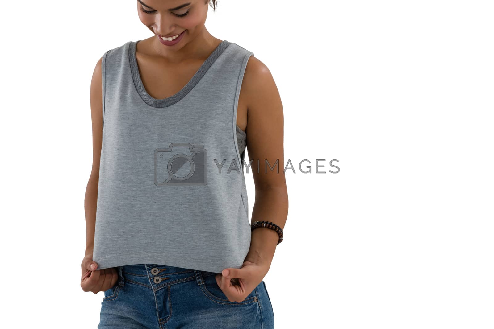 Royalty free image of Smiling young woman in casual clothing by Wavebreakmedia