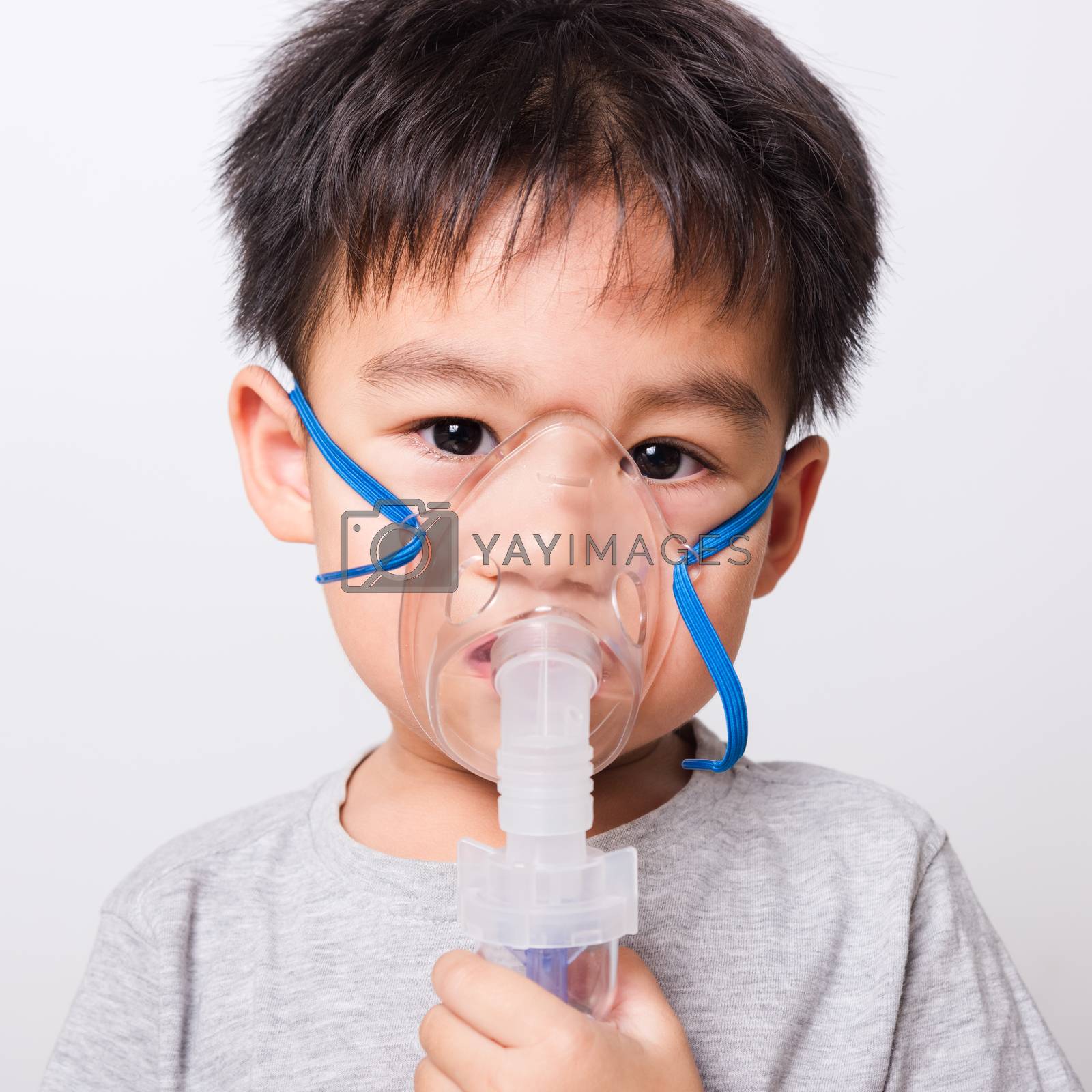 Royalty free image of Closeup Asian face, Little children boy sick he using steam inha by Sorapop