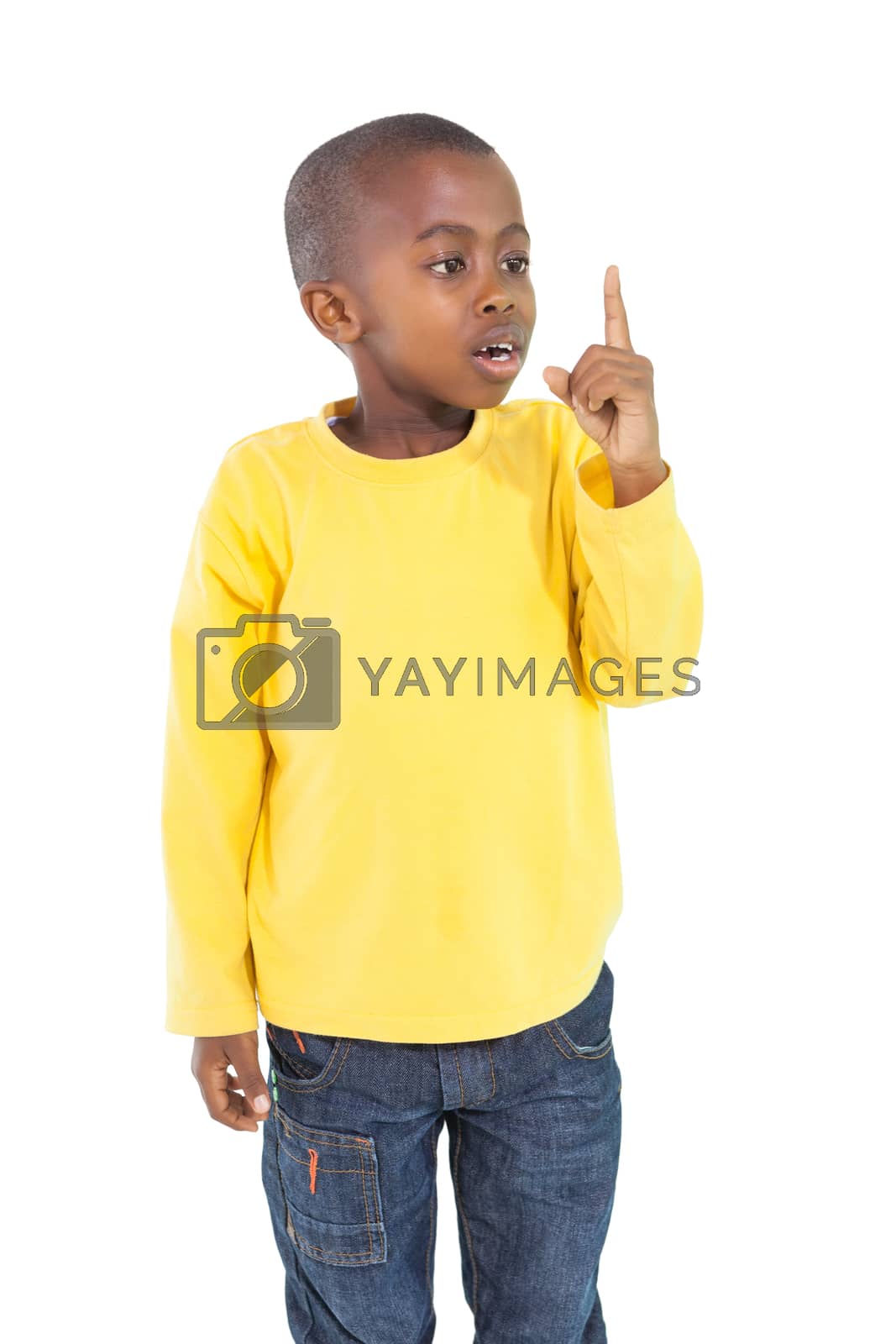 Royalty free image of Happy little boy pointing up by Wavebreakmedia