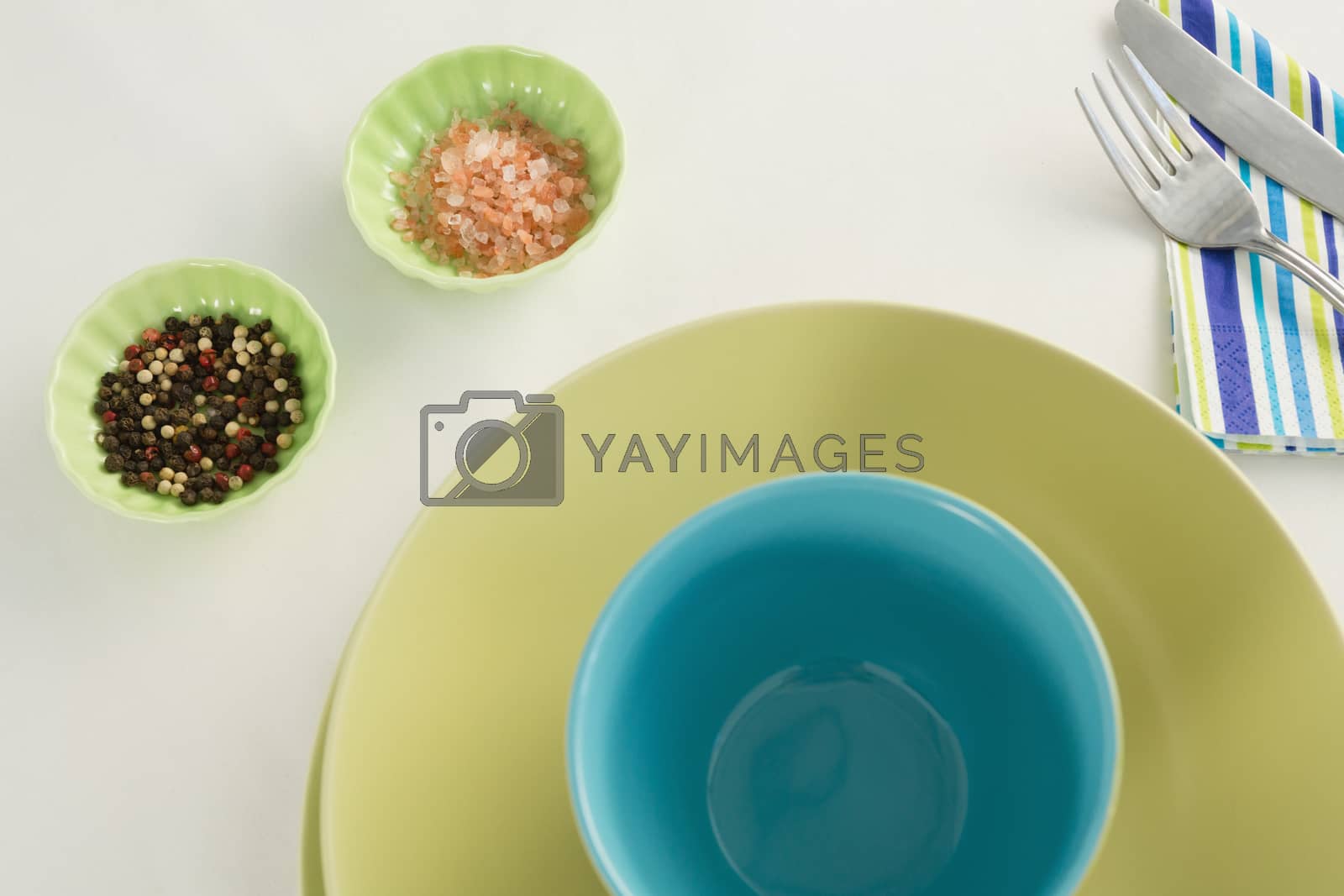 Royalty free image of Cutlery with bowls and ingredients by Wavebreakmedia