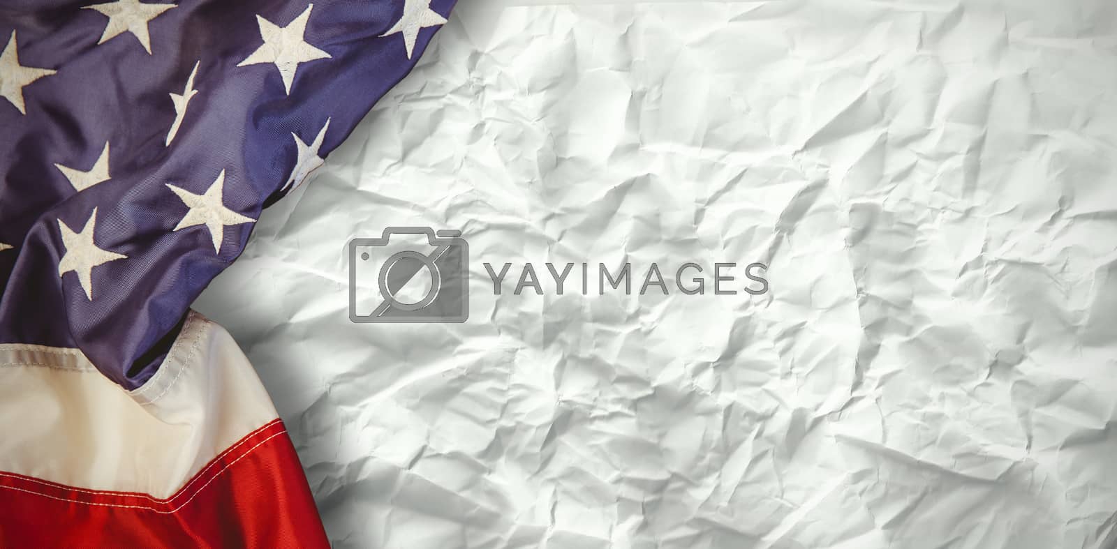 Royalty free image of Composite image of creased us flag by Wavebreakmedia