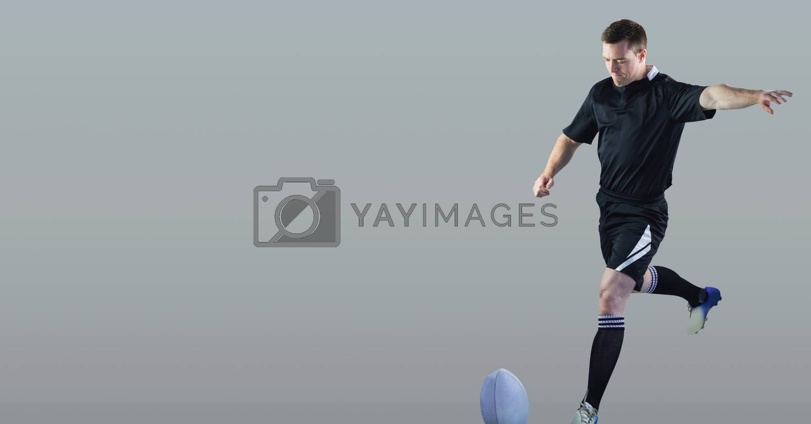Royalty free image of Rugby player with blank grey background by Wavebreakmedia