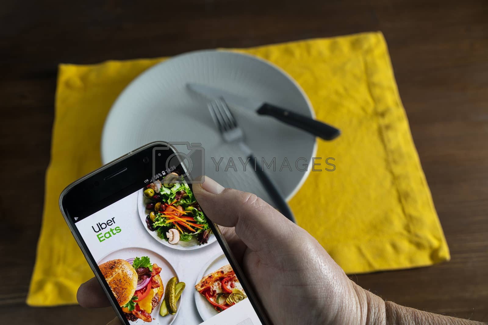 Royalty free image of Just Eat app on mobile phone by sergiodv