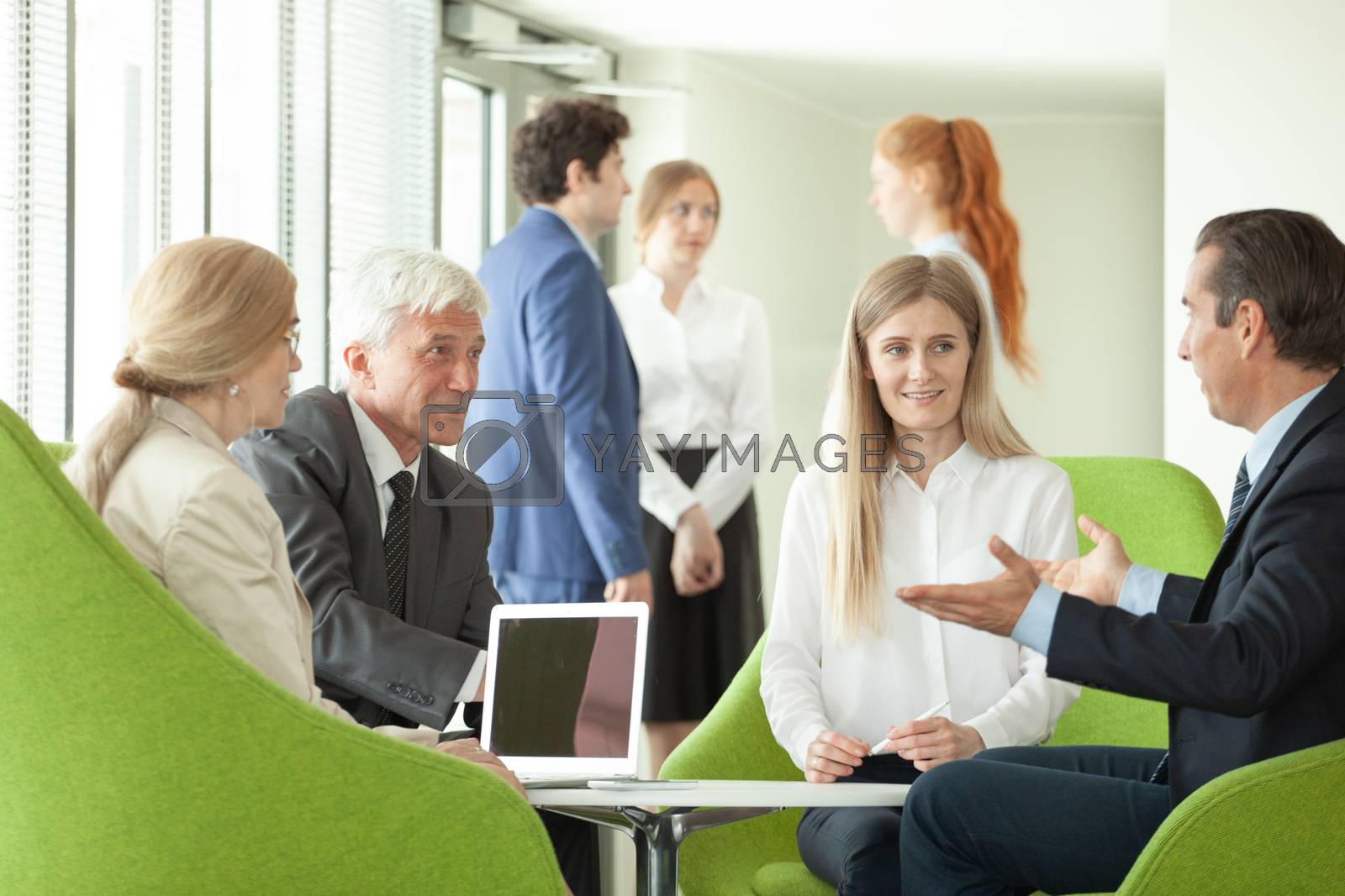 Royalty free image of Business people at negotiation by ALotOfPeople