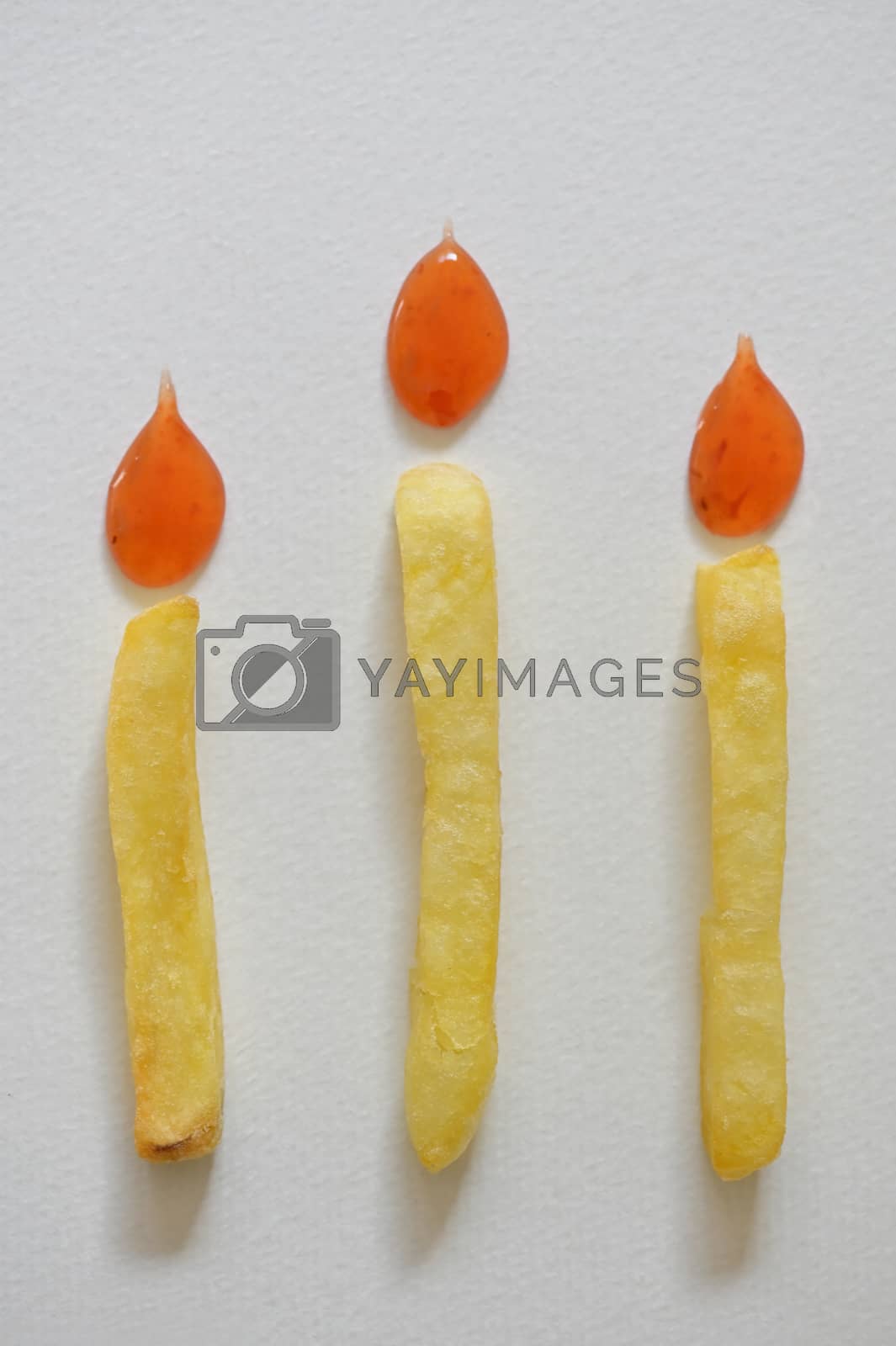 Royalty free image of Birthday Burning French Fries Candle by mady70