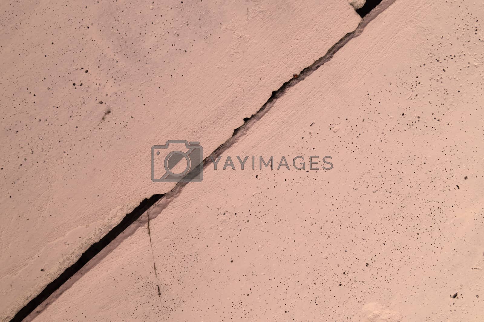 Royalty free image of The pink concrete wall. The wall is textured. by alexsdriver