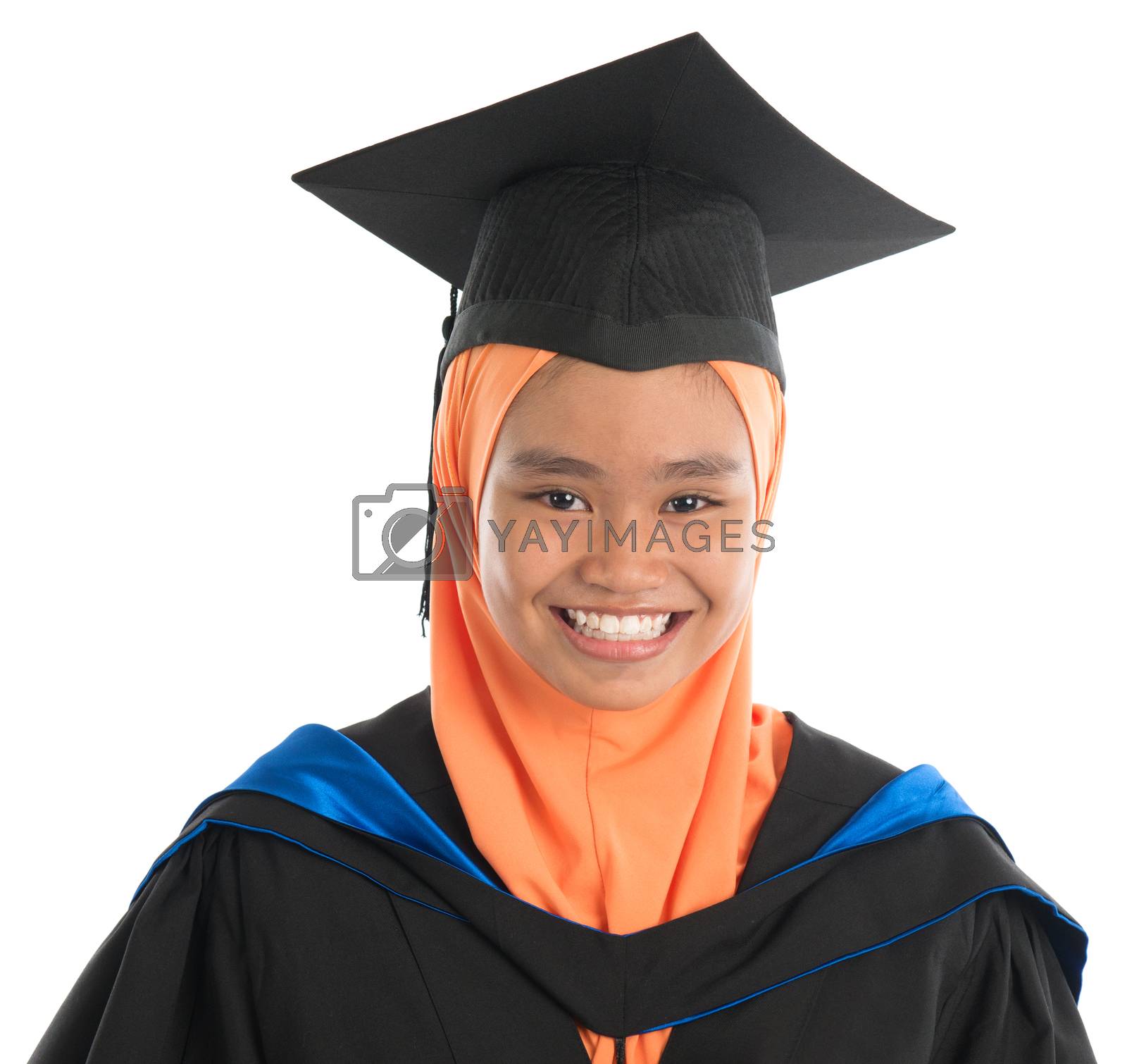 Royalty free image of Female student in graduation gown by szefei