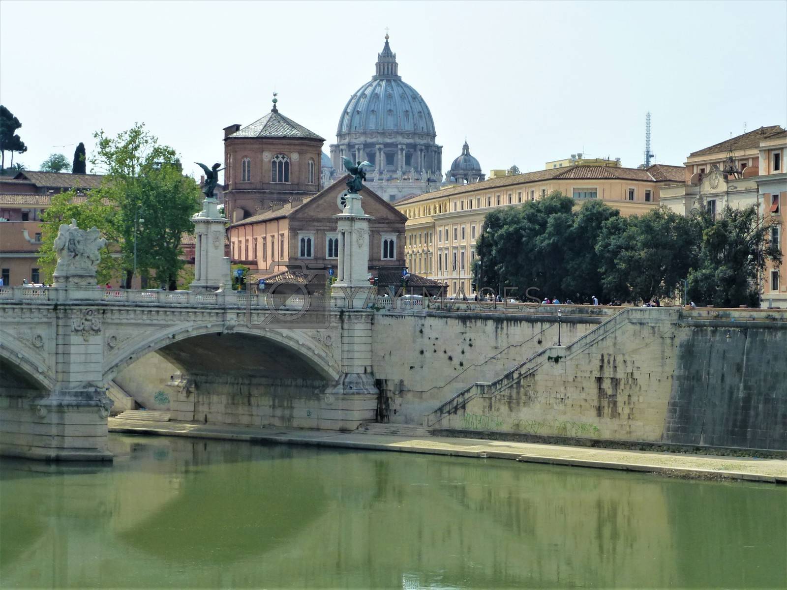 Royalty free image of Bridge over the Tiber river in Rome with Saint Peters Basilica by pisces2386