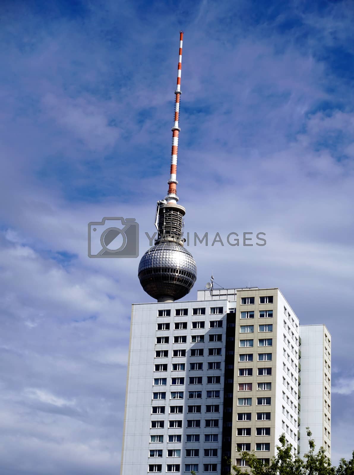 Royalty free image of Berlin Fernsehturm behind apartment house by pisces2386