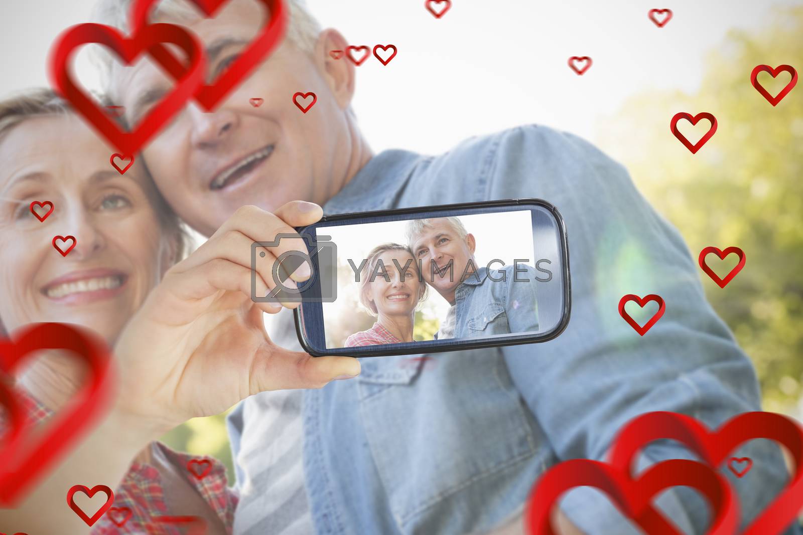 Royalty free image of Couple taking Valentines selfie by Wavebreakmedia