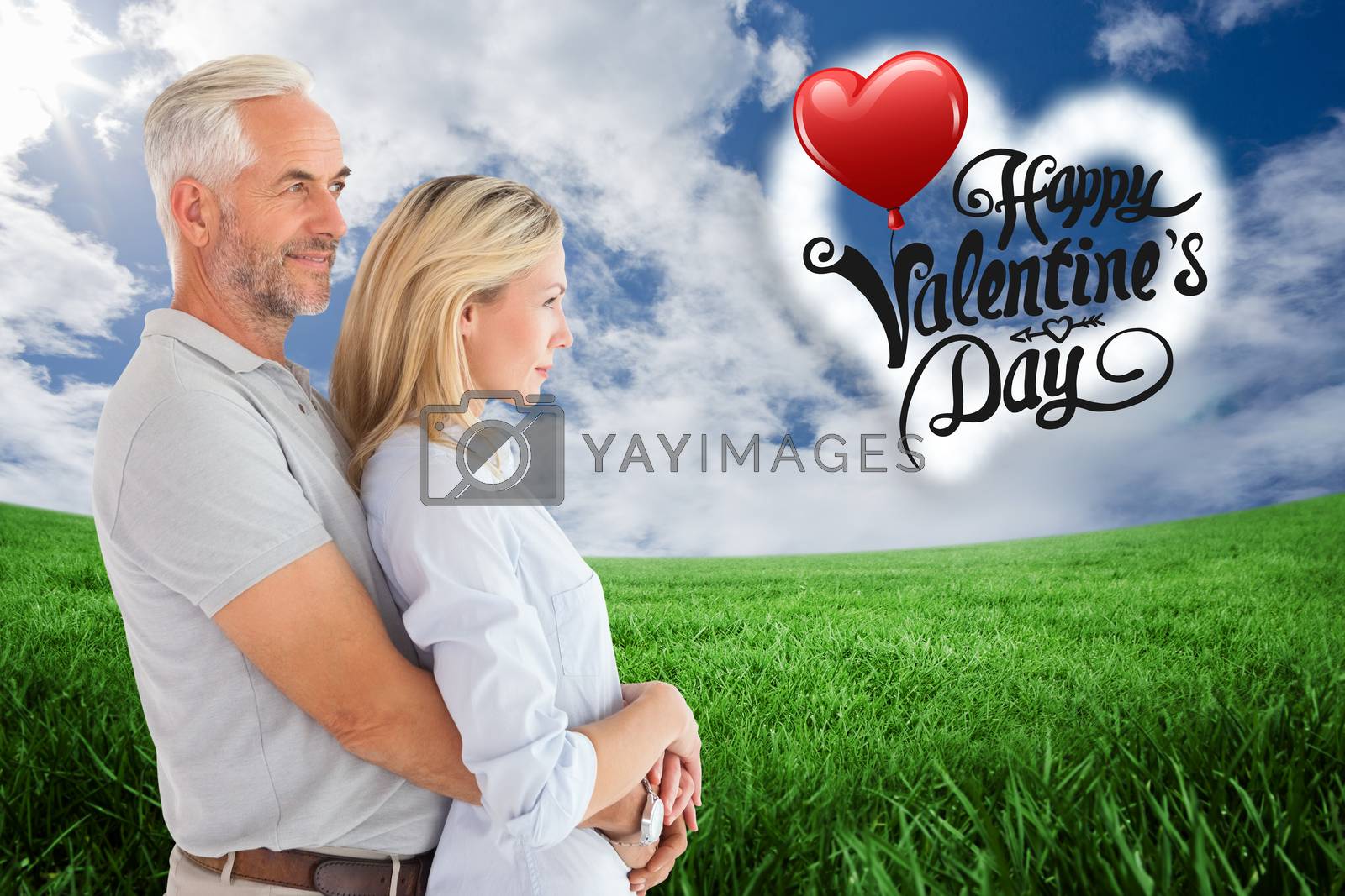 Royalty free image of Composite image of happy couple smiling and embracing by Wavebreakmedia