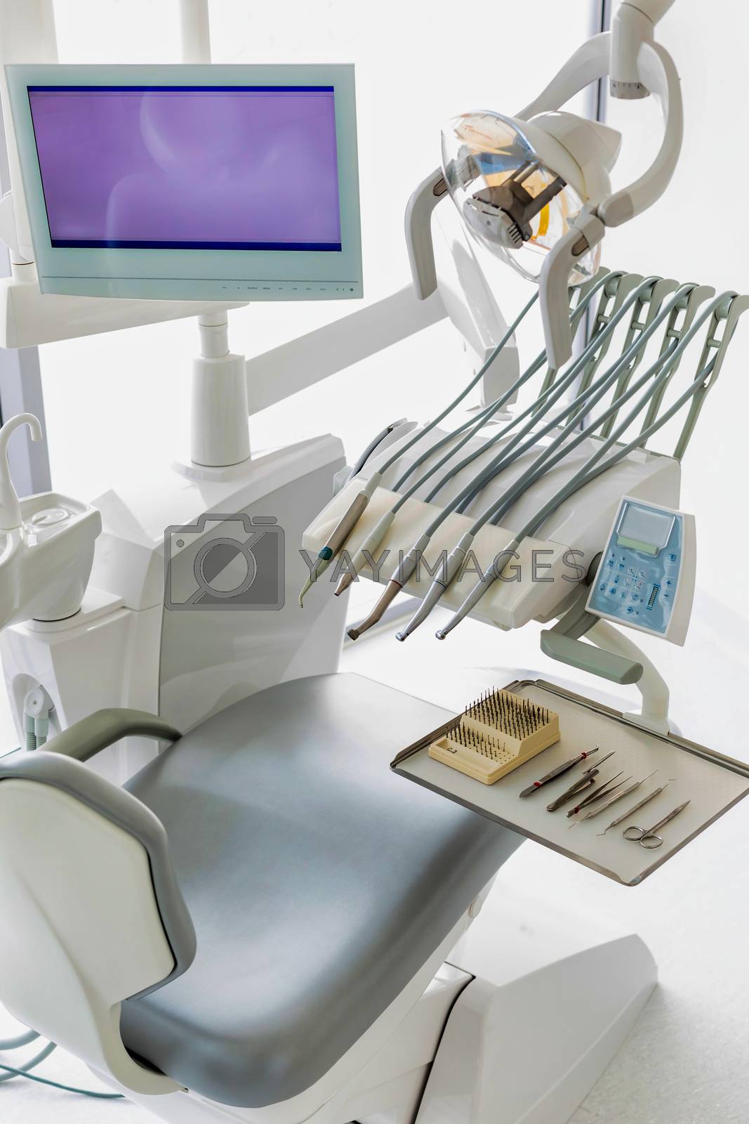 Royalty free image of Dental clinic and dental instruments by moodboard