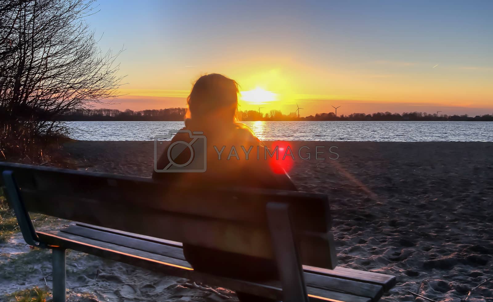 Royalty free image of Beautiful and romantic sunset at a lake in yellow and orange col by MP_foto71