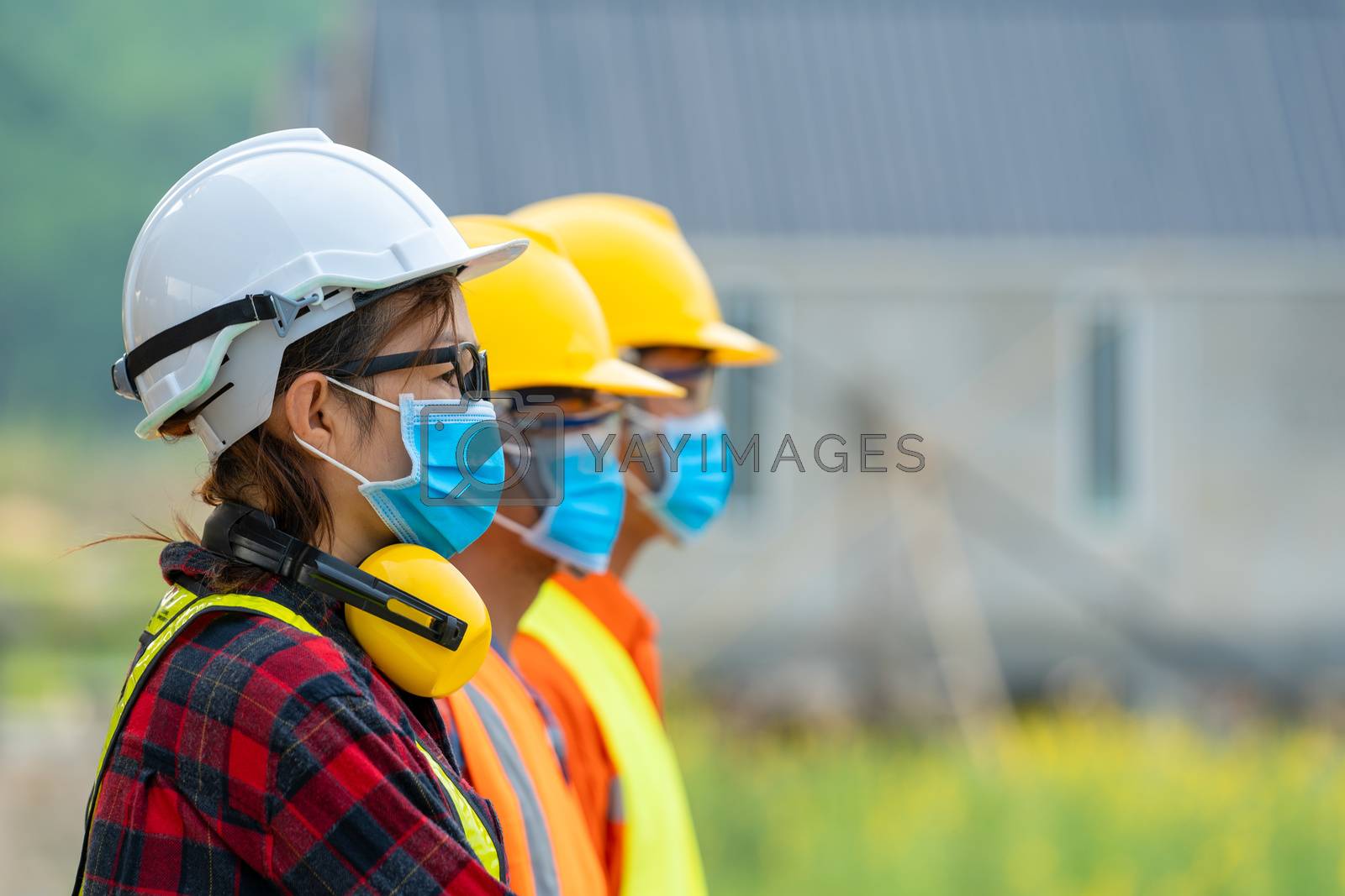 Royalty free image of Worker wearing protective mask to Protect Against Covid-19 by Visoot