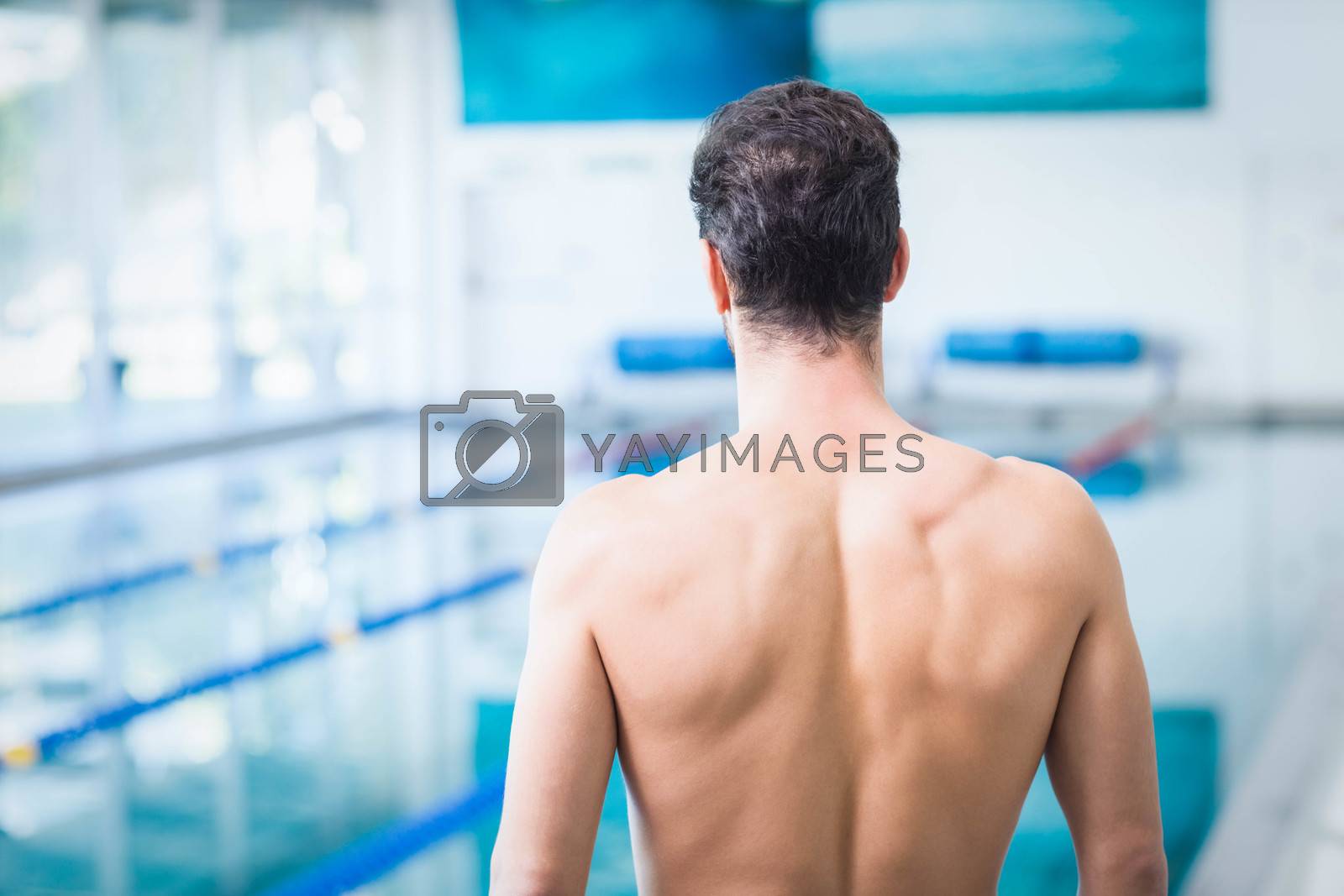 Royalty free image of Rear view of fit man standing by Wavebreakmedia