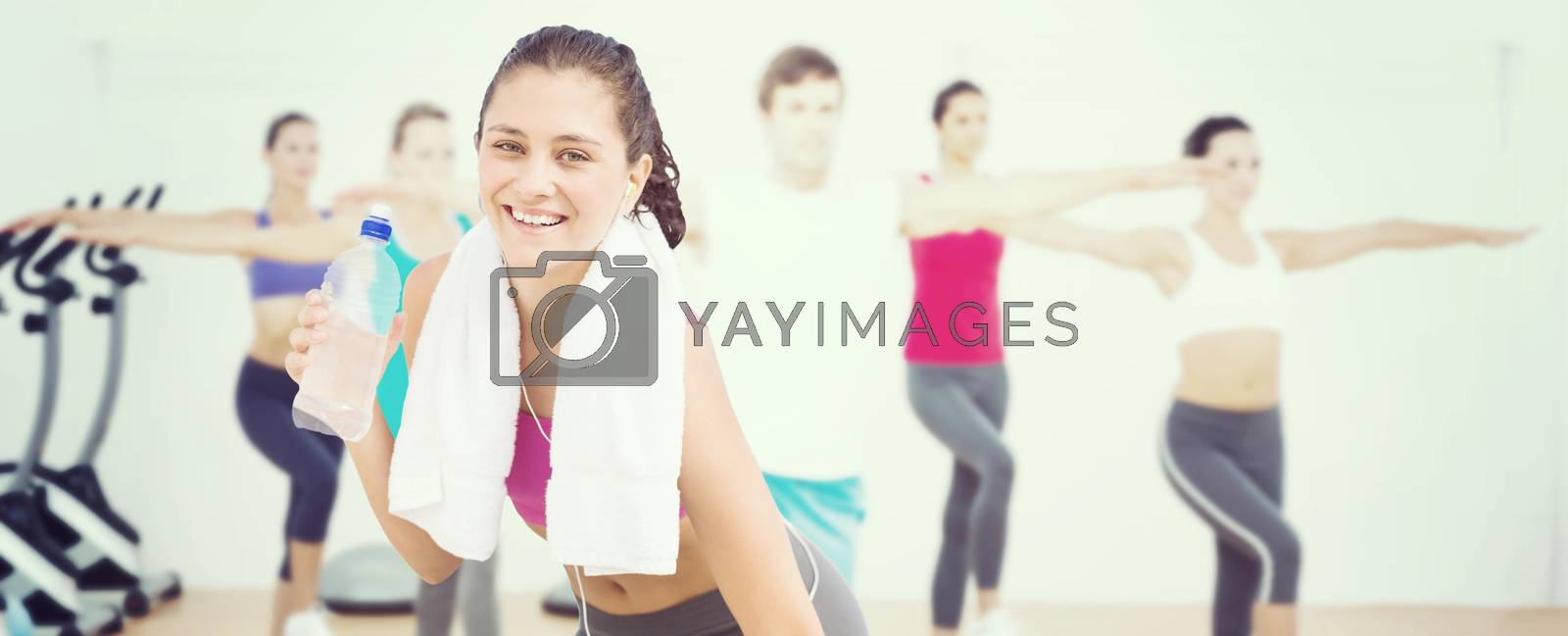 Royalty free image of Composite image of fit woman with water by Wavebreakmedia