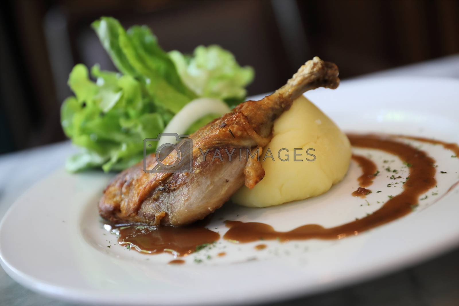 Royalty free image of confit de canard , Duck confit with vegetable by piyato