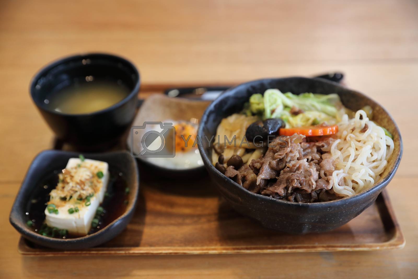 Royalty free image of Sukiyaki donburi , sukiyaki hot pot stew with Japanese rice in b by piyato