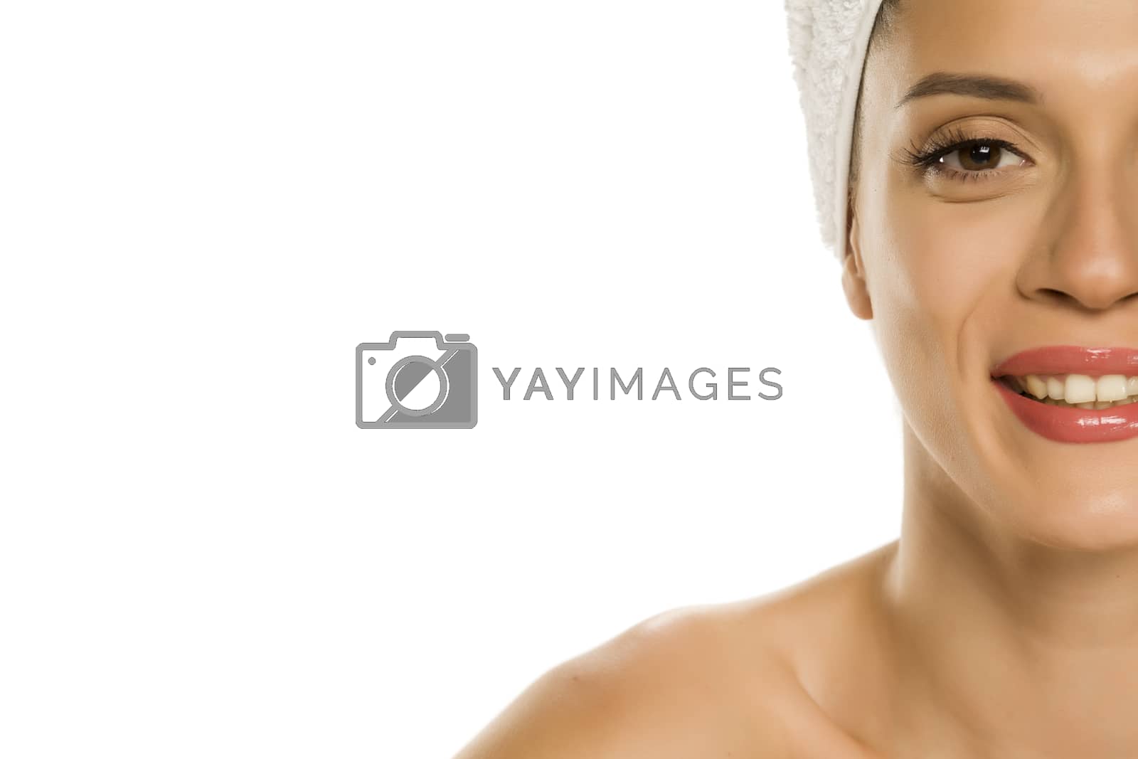 Royalty free image of Young beautiful woman with towel on her head by Vladimirfloyd