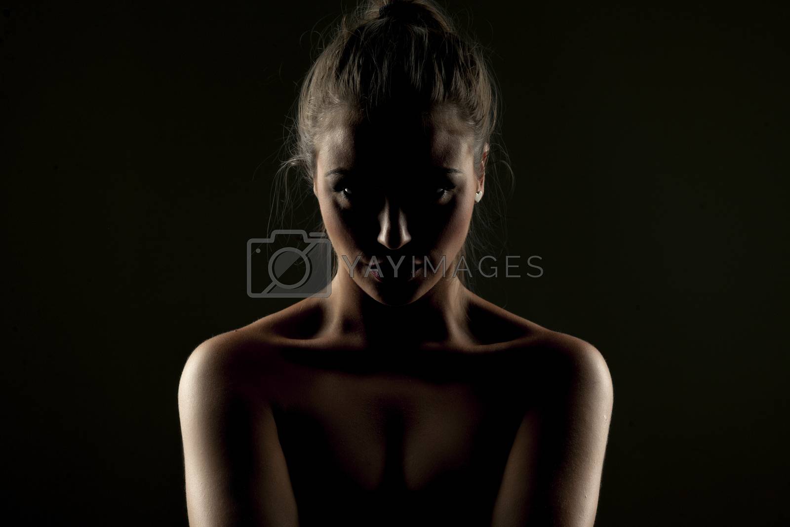 Royalty free image of Mysterious portrait of woman n shadow by Vladimirfloyd