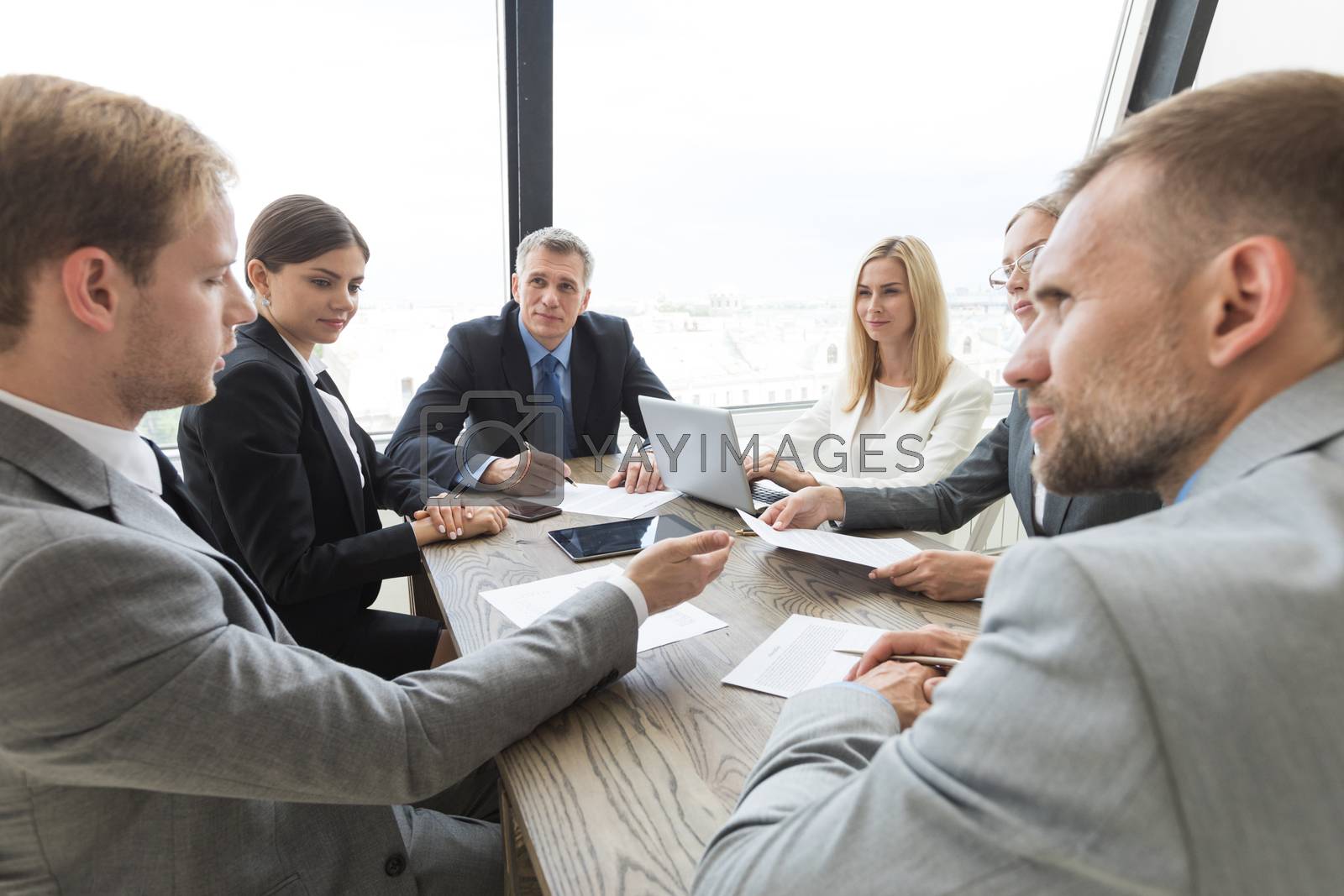 Royalty free image of Business people at meeting by Yellowj
