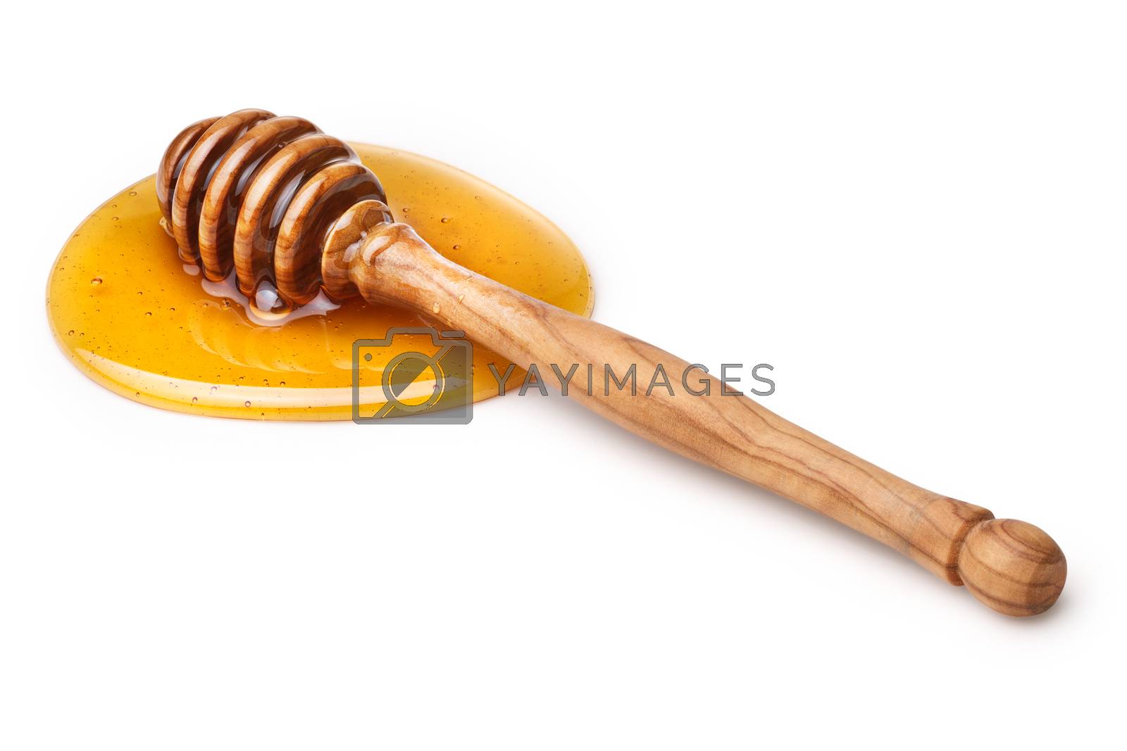 Royalty free image of Wooden honey dipper by maxsol