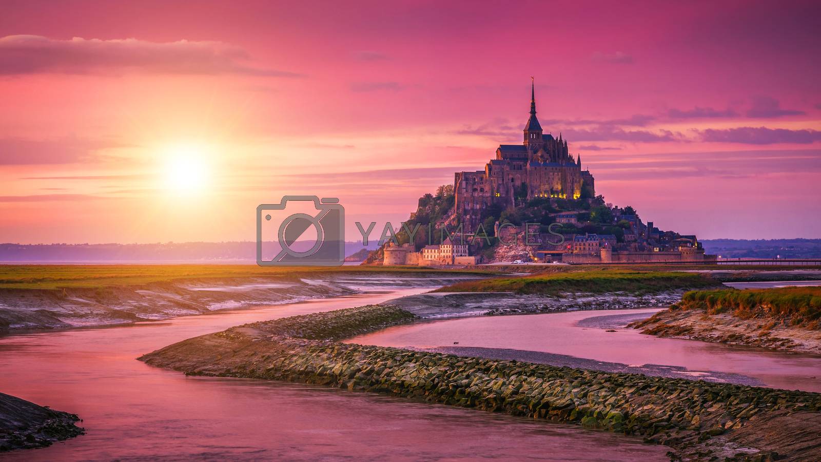 Royalty free image of Panoramic view of famous Le Mont Saint-Michel tidal island at su by DaLiu