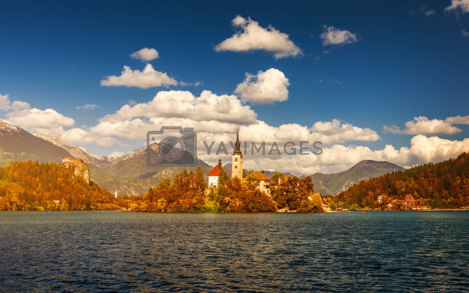 Royalty free image of Autumn view on Bled Lake with Pilgrimage Church of the Assumptio by DaLiu