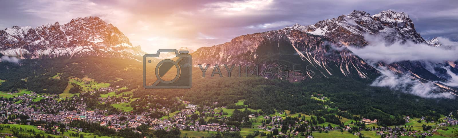 Royalty free image of Cortina d'Ampezzo town panoramic view with alpine green landscap by DaLiu
