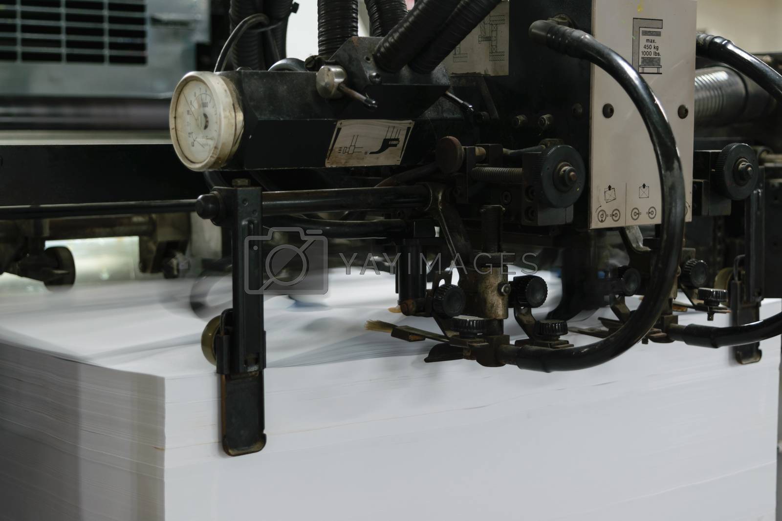 Royalty free image of Offset paper machine by PongMoji