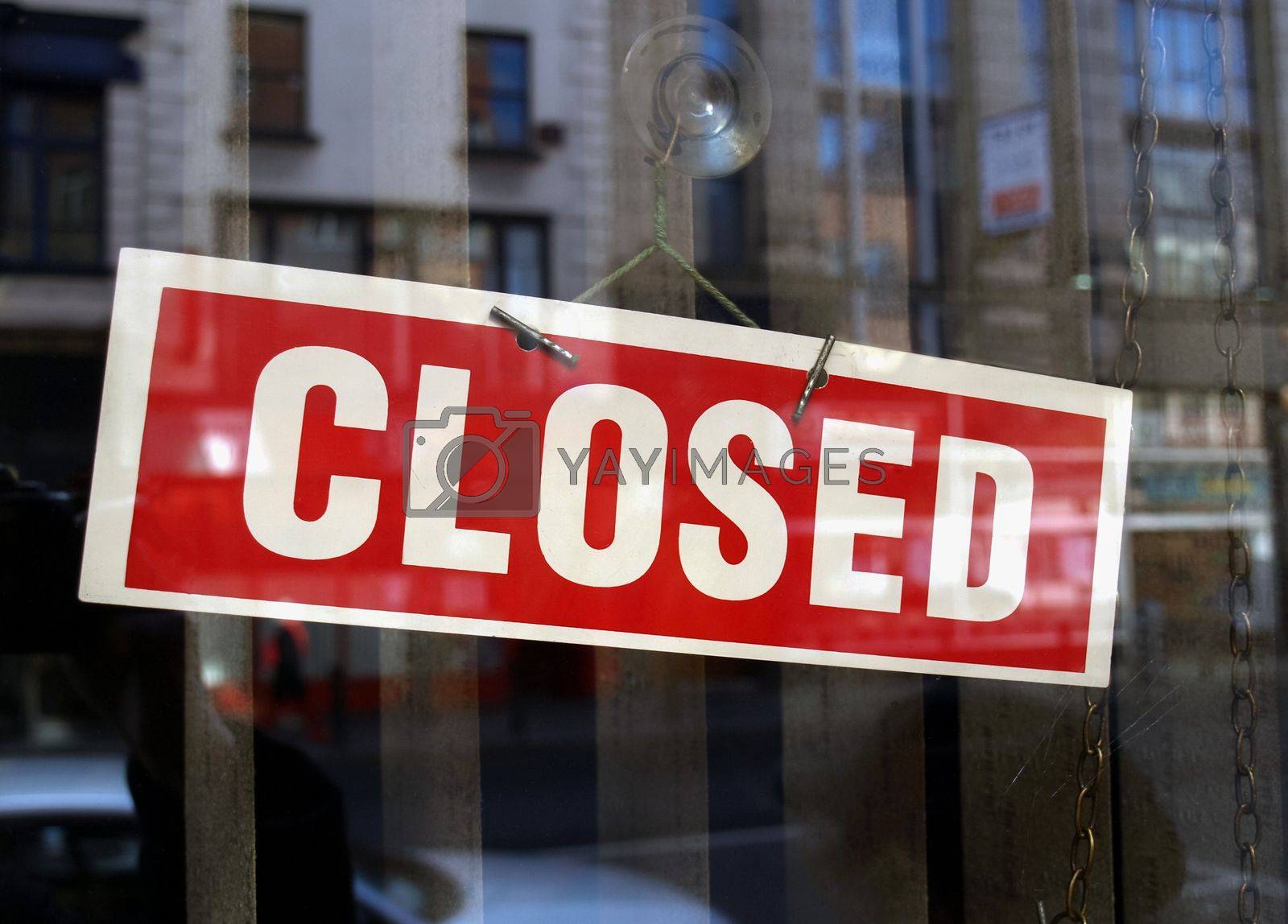 Royalty free image of Closed sign in shop window by claudiodivizia