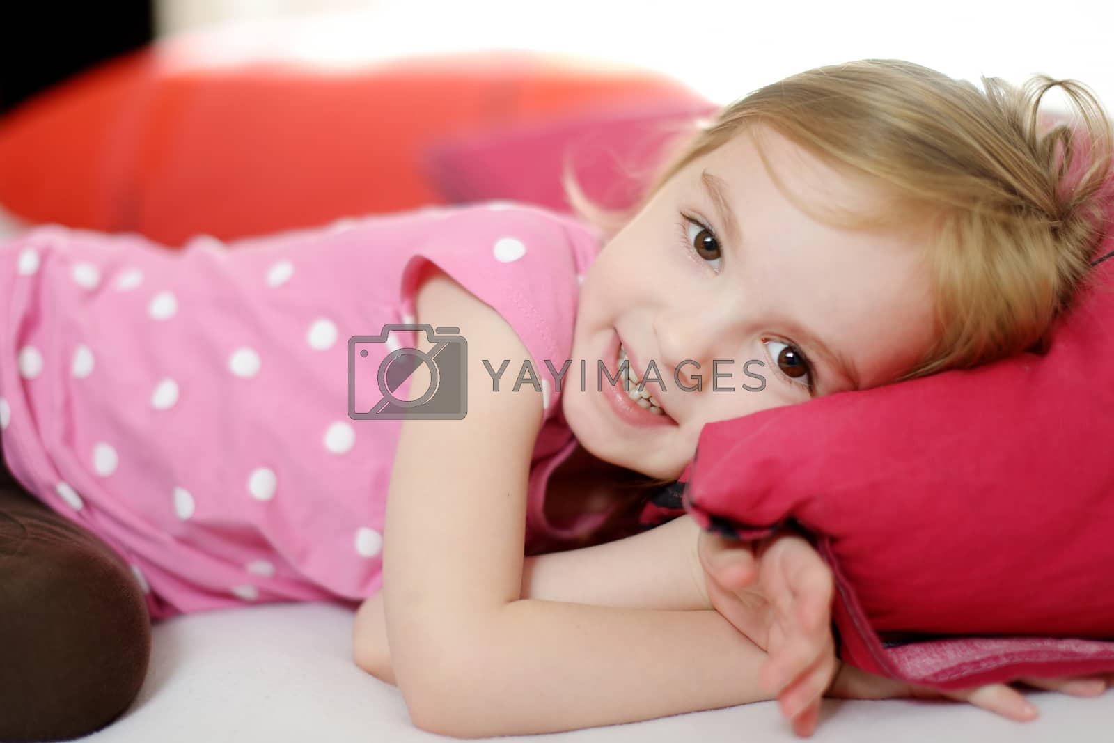 Royalty free image of Little toddler girl in pajamas by maximkabb