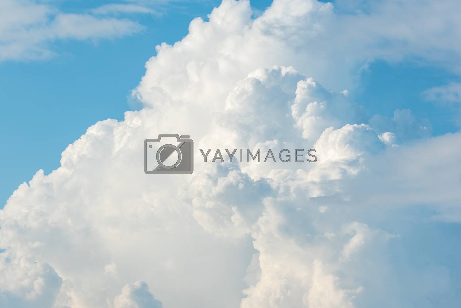 Royalty free image of Cloudscape with blue sky and white clouds by PongMoji