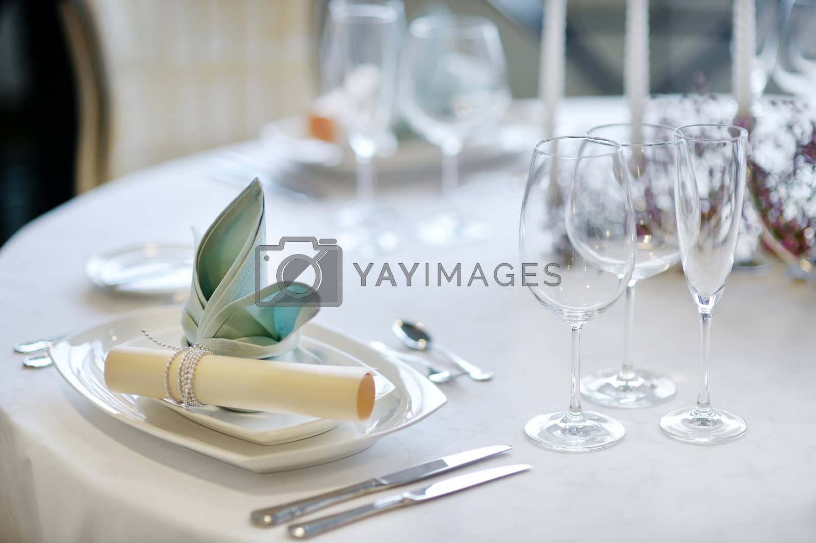 Royalty free image of Table setting for an event party by maximkabb